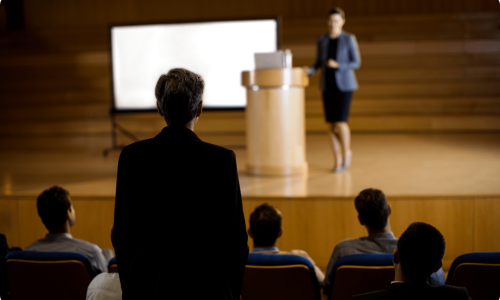 female-business-executive-giving-speech